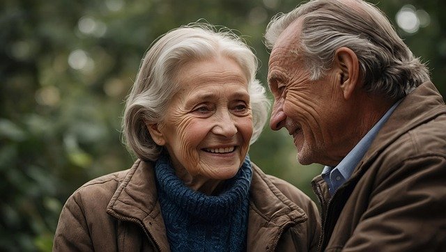Couple reviewing a retirement income and tax strategy with Solutions First Financial Group